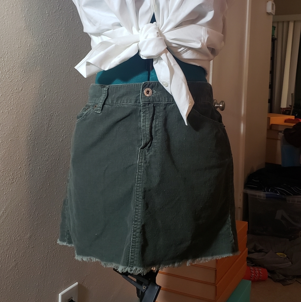 green denim skirt